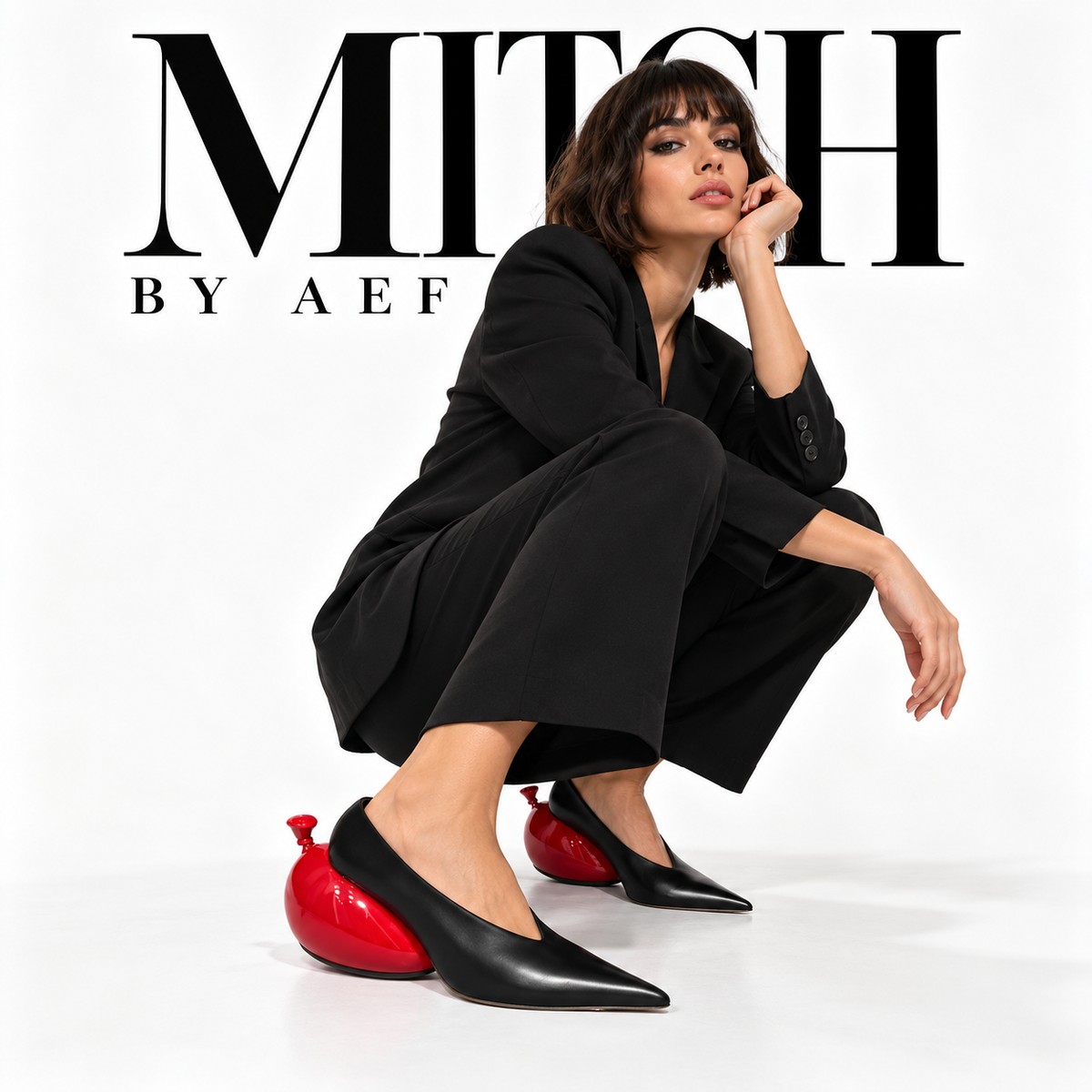Women's Black Pointed-Toe Pumps, Red Sculptural Heel, VÉRA