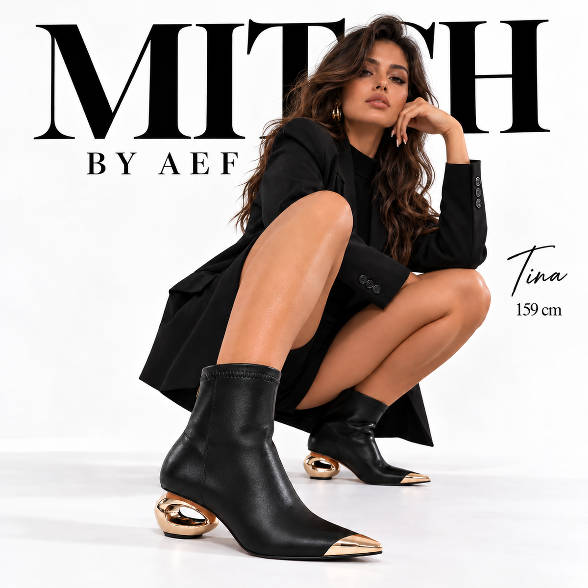 Bottines femme noires portées à talon sculptural et bout métallique MITCH BY AEF